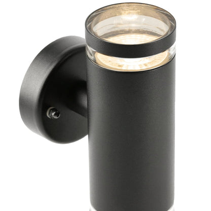 Our Jennifer black outdoor wall mounted up and down cylinder outdoor light would look perfect in a modern or more traditional home design. Outside wall lights can provide atmospheric light in your garden, at the front door or on the terrace as well as a great security solution. It is designed for durability and longevity with its robust material producing a fully weatherproof and water resistant light fitting.