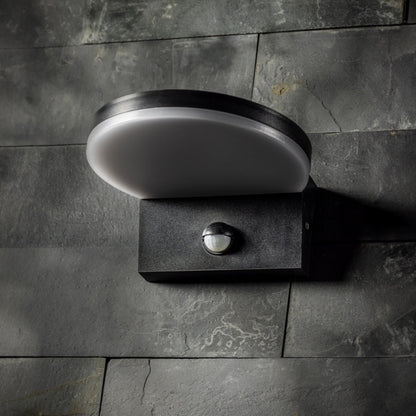 Our Aubrey black plastic ABS plastic outdoor wall mounted round outdoor light with built in LED's and motion sensor would look perfect in a modern or more traditional home design. Outside wall lights can provide atmospheric light in your garden, at the front door or on the terrace as well as a great security solution. It is designed for durability and longevity with its robust material producing a fully weatherproof and water resistant light fitting.