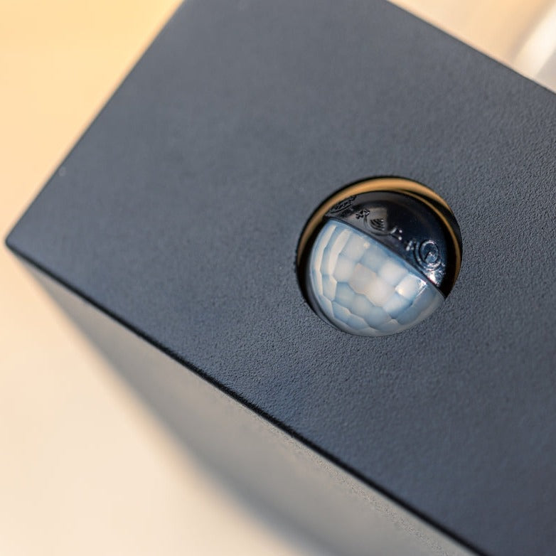 Our Marina black aluminium outdoor wall mounted lantern outdoor light with clear polycarbonate diffusers would look perfect in a modern or more traditional home design. Outside wall lights can provide atmospheric light in your garden, at the front door or on the terrace as well as a great security solution. It is designed for durability and longevity with its robust material producing a fully weatherproof and water resistant light fitting. Comes complete with a built in PIR motion sensor.