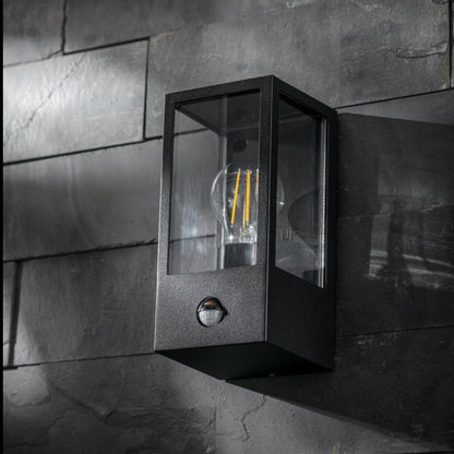 Our Marina black aluminium outdoor wall mounted lantern outdoor light with clear polycarbonate diffusers would look perfect in a modern or more traditional home design. Outside wall lights can provide atmospheric light in your garden, at the front door or on the terrace as well as a great security solution.