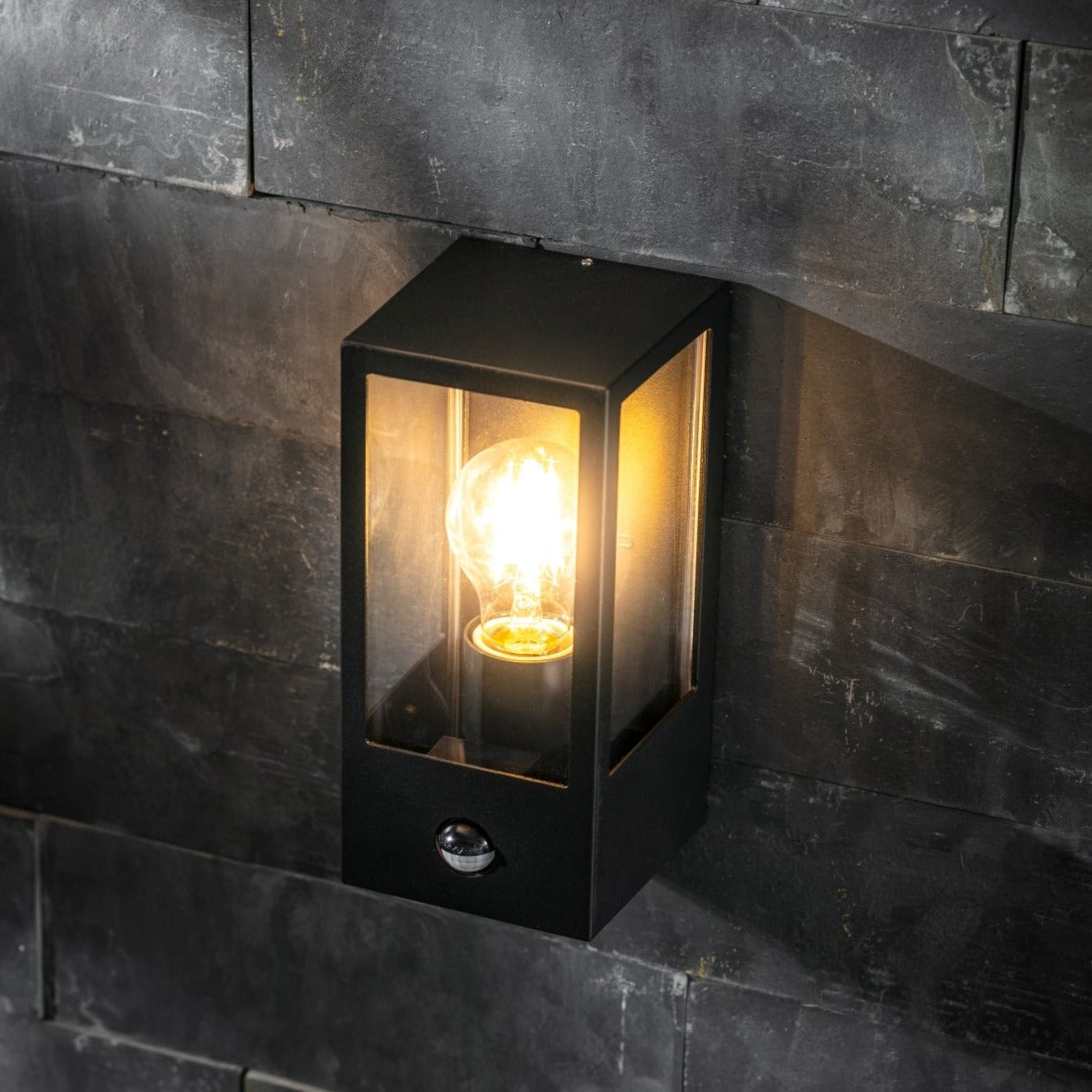 Our Marina black aluminium outdoor wall mounted lantern outdoor light with clear polycarbonate diffusers would look perfect in a modern or more traditional home design. Outside wall lights can provide atmospheric light in your garden, at the front door or on the terrace as well as a great security solution.