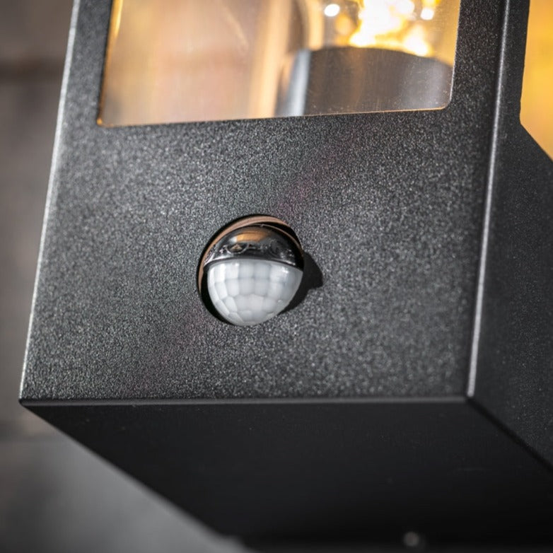 Our Marina black aluminium outdoor wall mounted lantern outdoor light with clear polycarbonate diffusers would look perfect in a modern or more traditional home design. Outside wall lights can provide atmospheric light in your garden, at the front door or on the terrace as well as a great security solution.