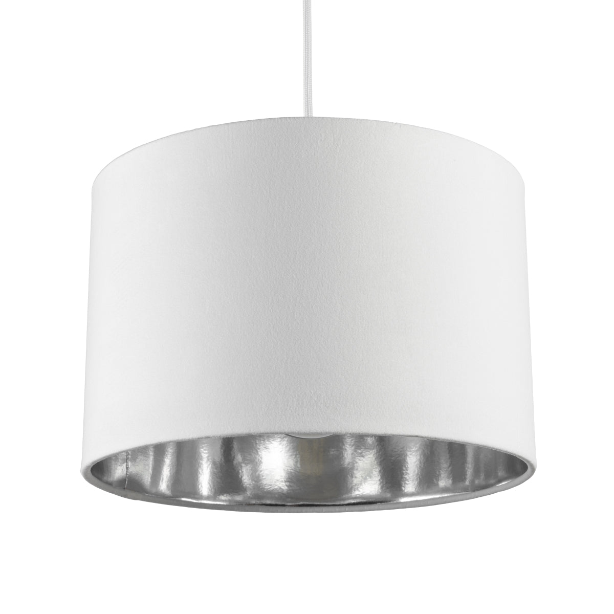 Our Nila velvet shade is sophisticated in appearance and we have designed the shade to  suit a range of interiors. Easy to fit, it’s crafted from high-quality velvet on the outer and has a reflective Silver metallic inner. It's made to fit both a ceiling light or lamp base.