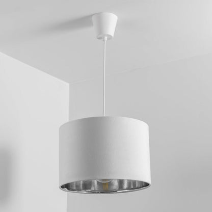 Our Nila velvet shade is sophisticated in appearance and we have designed the shade to  suit a range of interiors. Easy to fit, it’s crafted from high-quality velvet on the outer and has a reflective Silver metallic inner. It's made to fit both a ceiling light or lamp base.