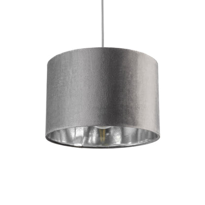 Our Nila velvet shade is sophisticated in appearance and we have designed the shade to  suit a range of interiors. Easy to fit, it’s crafted from high-quality velvet on the outer and has a reflective silver metallic inner. It's made to fit both a ceiling light or lamp base.