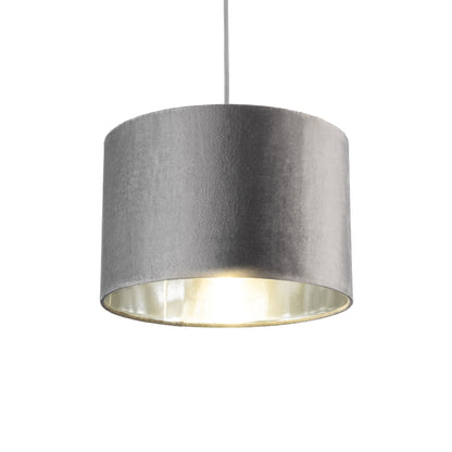 Our Nila velvet shade is sophisticated in appearance and we have designed the shade to  suit a range of interiors. Easy to fit, it’s crafted from high-quality velvet on the outer and has a reflective silver metallic inner. It's made to fit both a ceiling light or lamp base.
