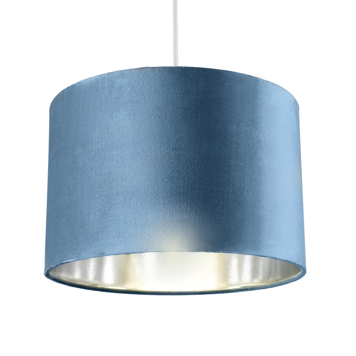 Our Nila velvet shade is sophisticated in appearance and we have designed the shade to  suit a range of interiors. Easy to fit, it’s crafted from high-quality velvet on the outer and has a reflective silver metallic inner. It's made to fit both a ceiling light or lamp base.