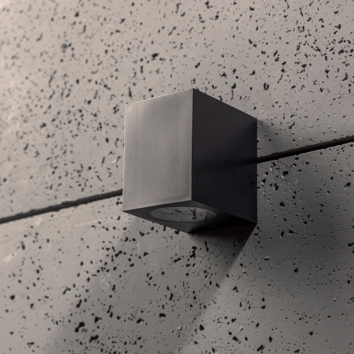 Our Eileen black wall mounted rectangle outdoor light would look perfect in a modern or more traditional home design. Outside wall lights can provide atmospheric light in your garden, at the front door or on the terrace as well as a great security solution. It is designed for durability and longevity with its robust material producing a fully weatherproof and water resistant light fitting.