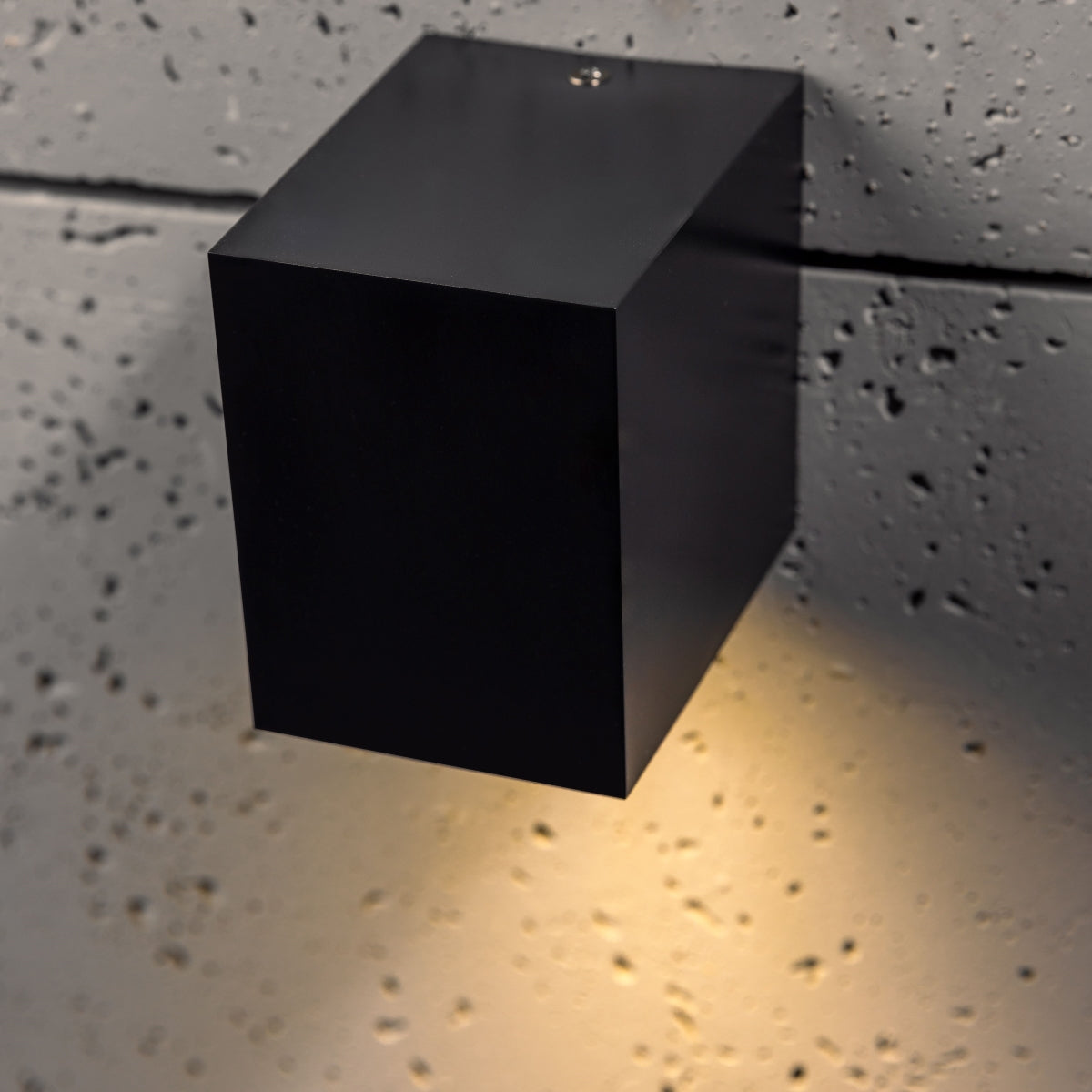 Our Eileen black wall mounted rectangle outdoor light would look perfect in a modern or more traditional home design. Outside wall lights can provide atmospheric light in your garden, at the front door or on the terrace as well as a great security solution. It is designed for durability and longevity with its robust material producing a fully weatherproof and water resistant light fitting.