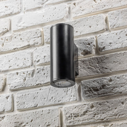 Our Sherri up and down black cylinder wall light would look perfect in a modern or more traditional home design. Outside lights can provide atmospheric light in your garden, at the front door, patio, walls driveway or on the terrace as well as a great security solution. It is designed for durability and longevity with its robust material producing a fully weatherproof and water resistant light fitting. 