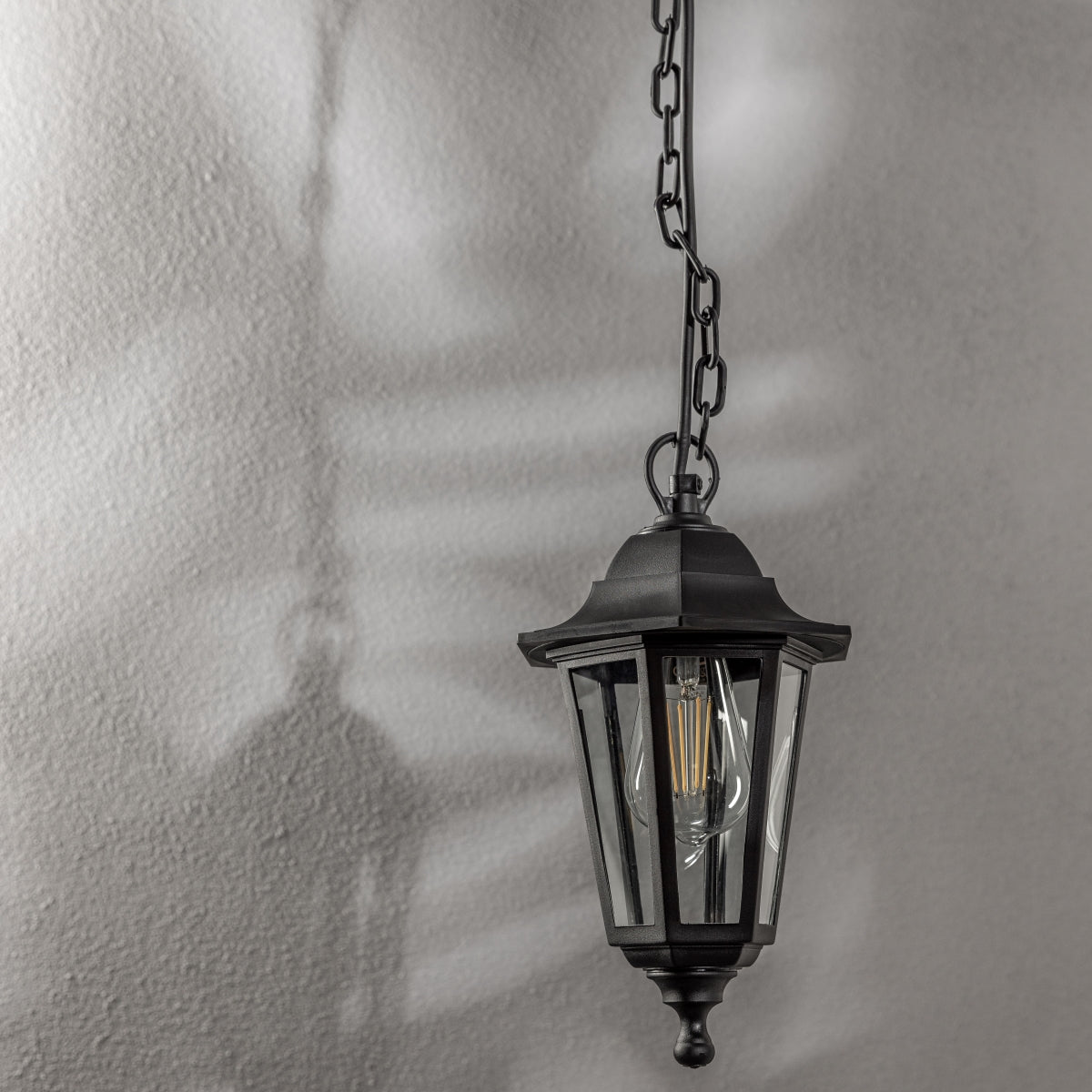 Our Yasmin lantern delivers on style and durability and is a smart choice for your exterior lighting. With its black polycarbonate construction teamed with clear polycarbonate panes, this lantern is hardwearing and rust and weatherproof. Built for life outdoors, it has an IP44 rating which means it can withstand the harshest of weather conditions. For sophisticated yet robust outdoor lighting, our Yasmin black outdoor traditional lantern is a strong contender.
