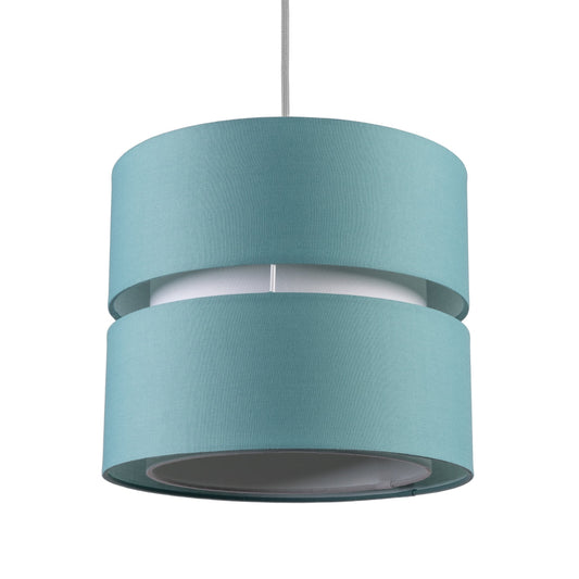Our Gayle easy-fit two tiered luxury fabric double layered shade is contemporary in its appearance and we have designed the shade to suit a range of interiors. Easy to fit simply attached to an existing pendant flitting.  It is crafted from high quality fabric material in two layers and complimented with a white inner which looks beautiful when light shines through. The shade has been made to fit both a ceiling light or lamp base.