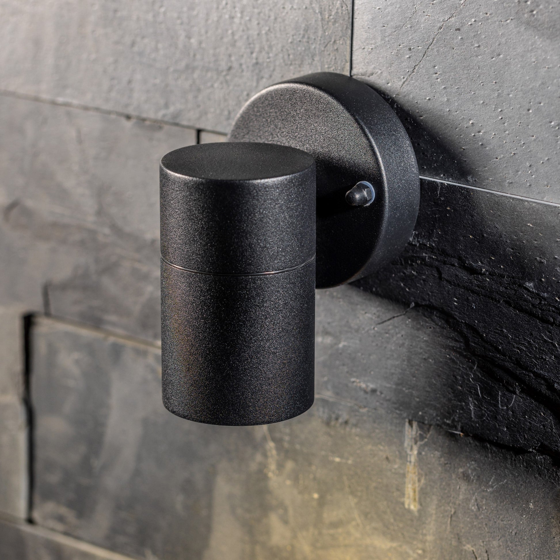 Our Leon outdoor single down light is modern and stylish in its appearance.  It comes in a cylinder design mounted on a circular back plate and clear glass diffuser. It is designed for durability and longevity with its robust material producing a fully weatherproof and water resistant light fitting