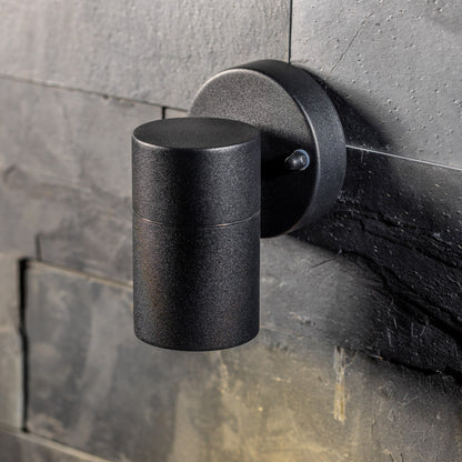 Our Leon outdoor single down light is modern and stylish in its appearance.  It comes in a cylinder design mounted on a circular back plate and clear glass diffuser. It is designed for durability and longevity with its robust material producing a fully weatherproof and water resistant light fitting