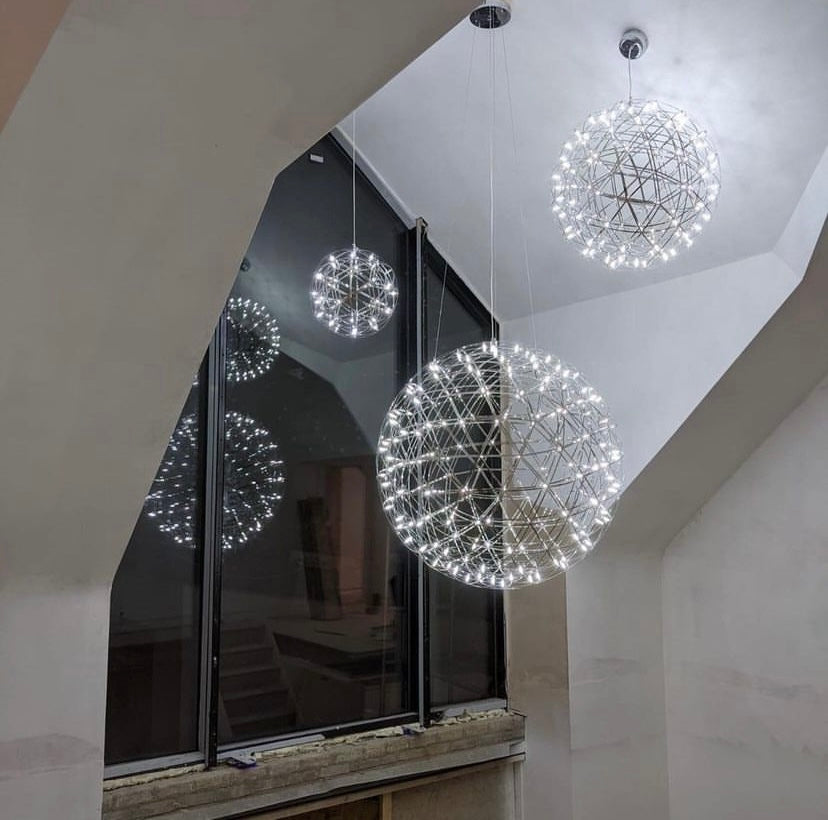 Our striking 80cm XXL large silver starburst light is the perfect way to make a statement with your interiors. It is inspired by elements of the night sky, comprising of a delicately crafted stainless steel round spherical shape and perfectly finished in LED lights