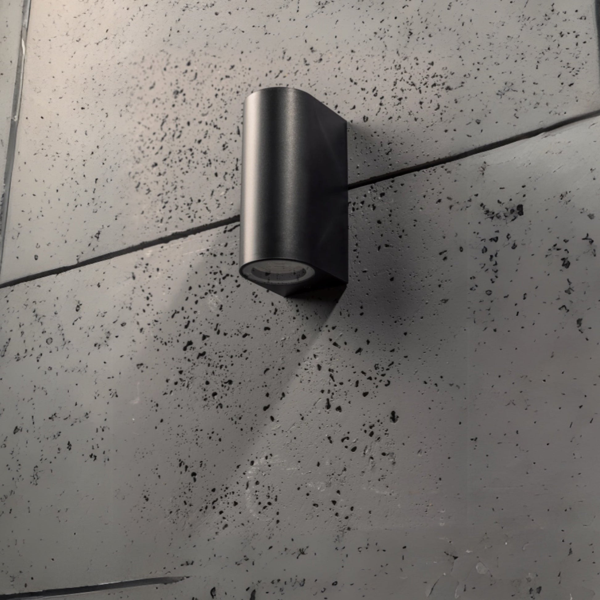 Our Eileen black wall mounted curved double outdoor spotlight light would look perfect in a modern or more traditional home design. Outside wall lights can provide atmospheric light in your garden, at the front door or on the terrace as well as a great security solution. It is designed for durability and longevity with its robust material producing a fully weatherproof and water resistant light fitting.