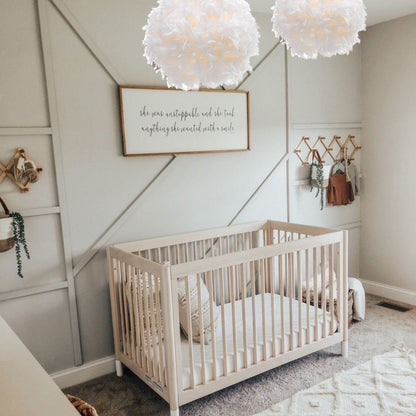Our Rio easy fit white feather lamp shade is constructed from delicate feathers in a large round shape. This beautiful shade is perfect for adding a touch of fun and elegance to your room. Can be used as either a table lamp shade or a ceiling shade.