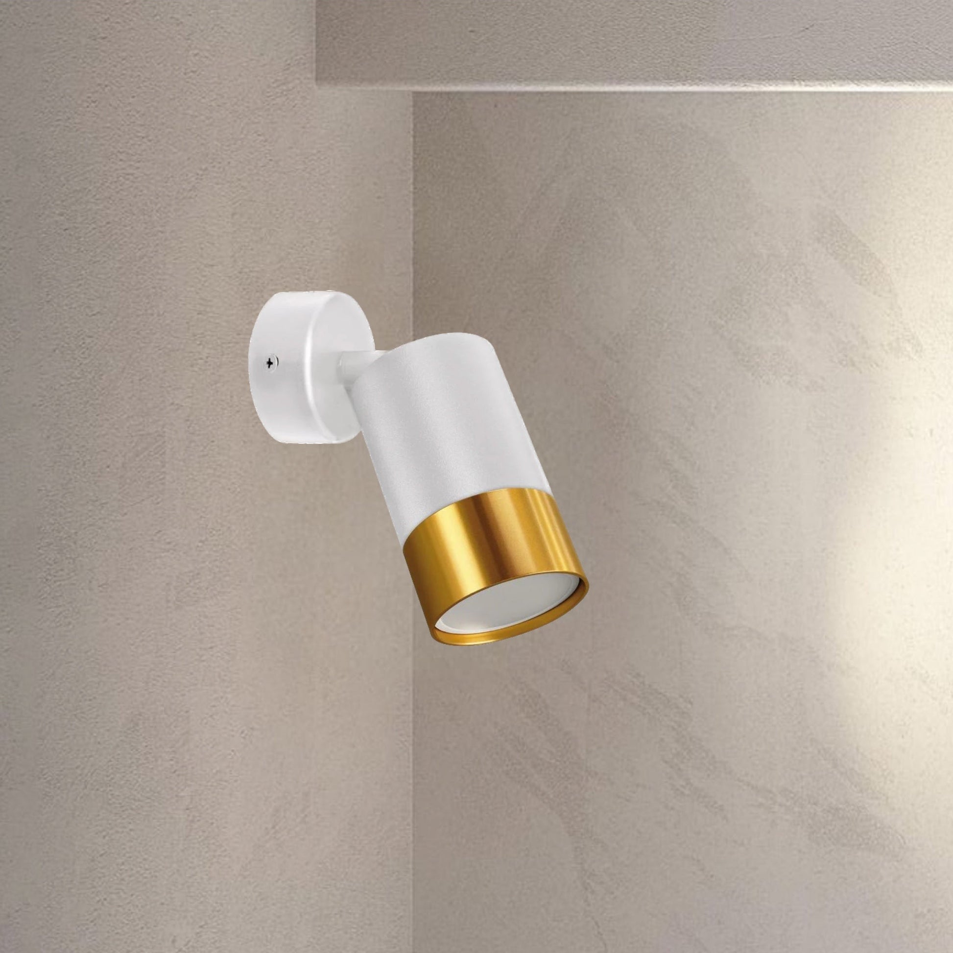 Our Puzon adjustable wall or ceiling spot light has a sleek and modern circular design with a powder coated exterior and gold interior. A simple, white spotlight is a perfect complement to classic or modern interiors the Puzon can be mounted on either wall or ceiling. Ideal for the kitchen, dining room, bedroom, or living room. It has an IP20 rating, indicating that it is dustproof.