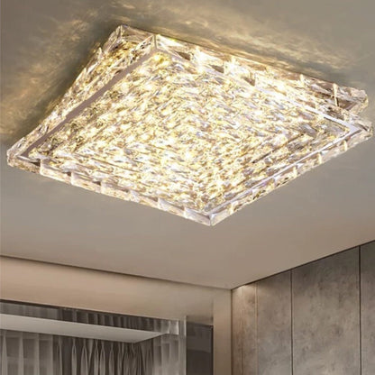 Introducing our Harmony ceiling light with its elegant crystal and golden finish it will be sure to make a stylish addition to any living space. It features an ornate cut glass crystal design encasing the entire light fitting and is complimented by a gold back plate that gives the light an undeniably luxurious style. Ceiling lamps don't come much more opulent than the Harmony ceiling light.