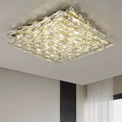 Introducing our Harmony ceiling light with its elegant crystal and golden finish it will be sure to make a stylish addition to any living space. It features an ornate cut glass crystal design encasing the entire light fitting and is complimented by a gold back plate that gives the light an undeniably luxurious style. Ceiling lamps don't come much more opulent than the Harmony ceiling light.