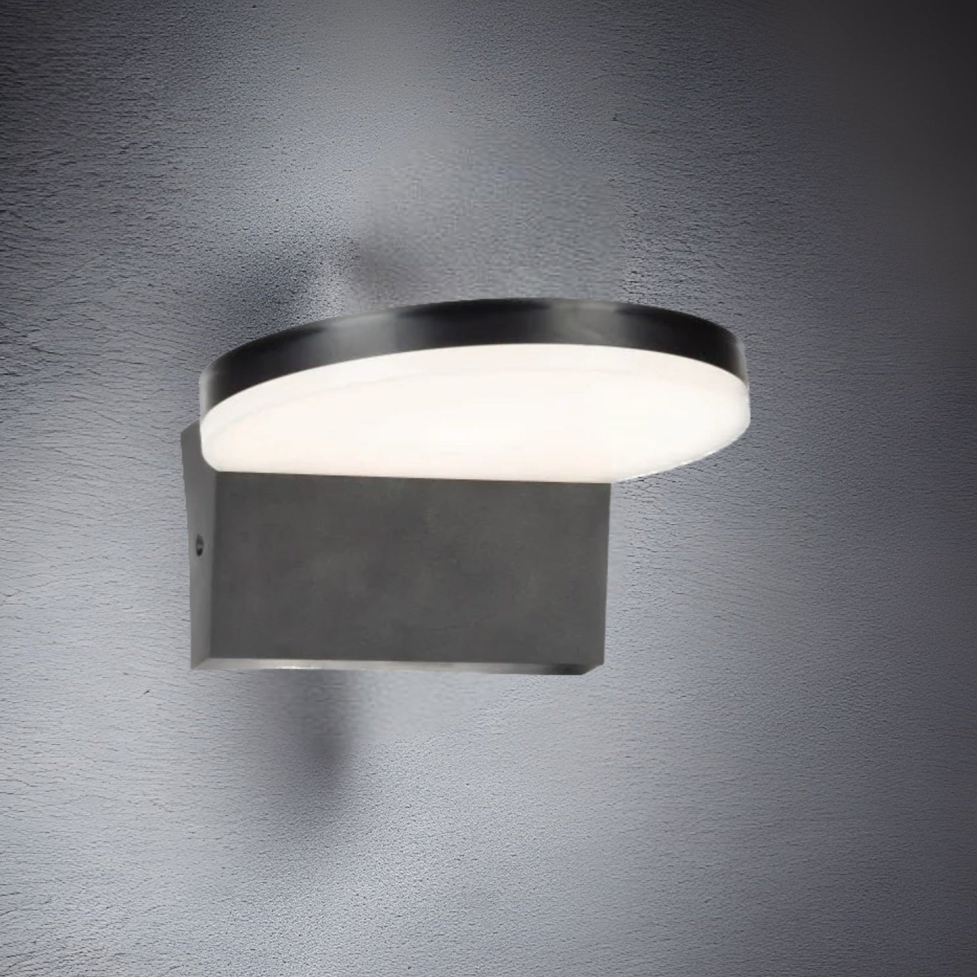 Our Aubrey black plastic ABS plastic outdoor wall mounted round outdoor light with built in LED's would look perfect in a modern or more traditional home design. Outside wall lights can provide atmospheric light in your garden, at the front door or on the terrace as well as a great security solution. It is designed for durability and longevity with its robust material producing a fully weatherproof and water resistant light fitting.