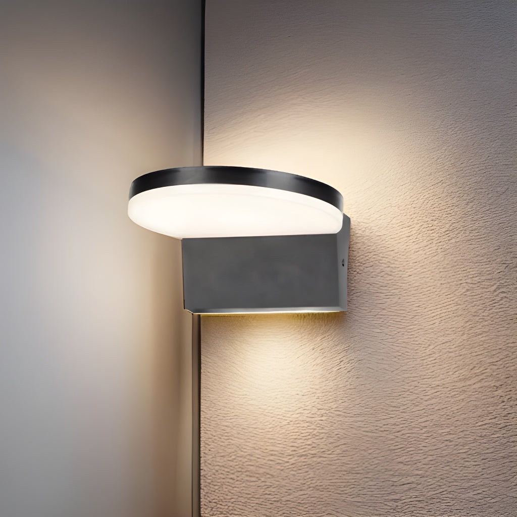 Our Aubrey black plastic ABS plastic outdoor wall mounted round outdoor light with built in LED's would look perfect in a modern or more traditional home design. Outside wall lights can provide atmospheric light in your garden, at the front door or on the terrace as well as a great security solution. It is designed for durability and longevity with its robust material producing a fully weatherproof and water resistant light fitting.