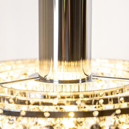 Our Liza easy fit ceiling pendant shade features polished chrome circular rings with varying lengths of acrylic crystal strands. This beautiful easy fit pendant shade will add glamour to any space whilst instantly updating your room without the need of an electrician. 