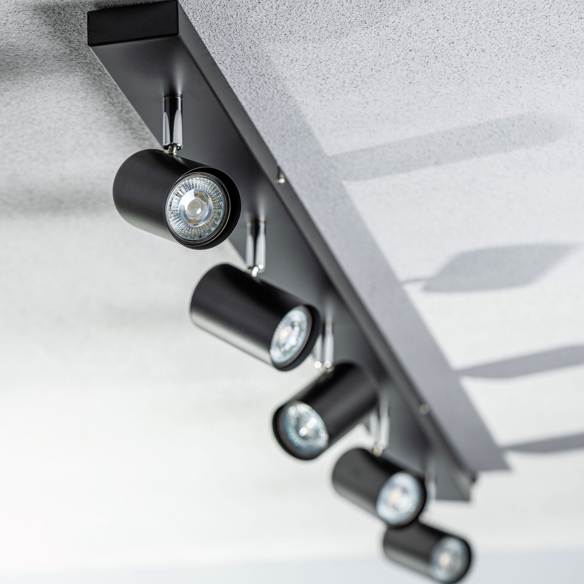 Add an industrial style to your home with the VENETO  spotlight light finished in white. The lamp is also ideal for task lighting due to the adjustable heads providing a focused beam. The simplistic design of this light fitting makes it suitable for all interior styles. 