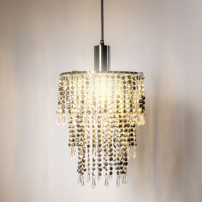Our Liza easy fit ceiling pendant shade features polished chrome circular rings with varying lengths of acrylic crystal strands. This beautiful easy fit pendant shade will add glamour to any space whilst instantly updating your room without the need of an electrician. 