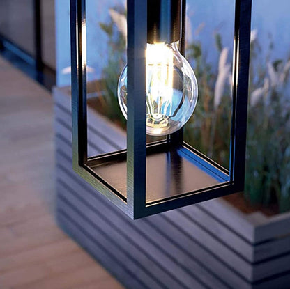 This industrial style outdoor light is made from an aluminium body with powder coated black finish and clear glass panes. Easy to install, and also suitable for installation outdoors and indoors, the chain is adjustable and can be fixed to your chosen height at the time of installation. This robust construction and easy set-up make it one of the most popular choices for outdoor lighting. Enjoy a reliable and luxurious lantern-style light option for any setting.